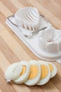 Sliced egg on the egg chopper Royalty Free Stock Photo