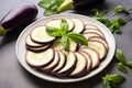 Sliced eggplant on plate. Generative AI