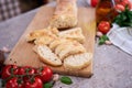 Sliced French bread baguette on wooden bread board Royalty Free Stock Photo