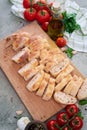 Sliced French bread baguette on wooden bread board Royalty Free Stock Photo