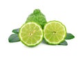 Sliced fresh bergamot with green leaves on white Royalty Free Stock Photo