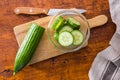 Sliced fresh green cucumber in bowl. Top view Royalty Free Stock Photo