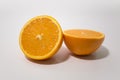 Sliced fresh orange cut in half on white background Royalty Free Stock Photo