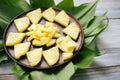 Sliced fresh pineapple in a bowl on the leaves Royalty Free Stock Photo