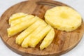 Sliced fresh pineapple served on the wooden board Royalty Free Stock Photo