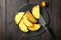 Sliced fresh pineapple on slate plate Royalty Free Stock Photo