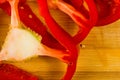 sliced fresh red paprika, bell pepper on bamboo cutting board Royalty Free Stock Photo