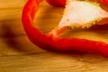 sliced fresh red paprika, bell pepper on bamboo cutting board Royalty Free Stock Photo