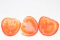Sliced fresh red tomatoes isolated on the white background Royalty Free Stock Photo