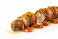 Sliced fried pork sausage with curry ketchup and curry powder, i Royalty Free Stock Photo