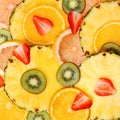 Sliced Fruits Background. Strawberry, Kiwi, Pineapple Royalty Free Stock Photo