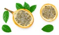 Sliced granadilla or yellow passion fruit with green leaves isolated on white background. exotic fruit. clipping path Royalty Free Stock Photo