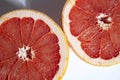 Sliced grapefruit isolated on white background