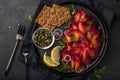 Sliced Gravlax,  scandinavian beet cured salmon  served with red onion, capers,  lemon and crisp bread Royalty Free Stock Photo