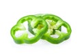 Sliced green bell pepper isolated on white Royalty Free Stock Photo