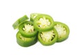 Sliced green jalapeno peppers on white