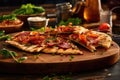 sliced grilled pizza on rustic board