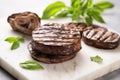 sliced grilled portobello mushroom on a marble countertop