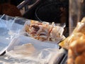 Sliced Grilled Sun Dried Squid in Foam Boxes Royalty Free Stock Photo