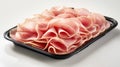 Sliced ham arranged on a black tray, ready for serving Royalty Free Stock Photo