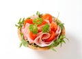 Sliced ham with arugula and tomatoes Royalty Free Stock Photo