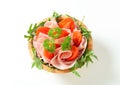 Sliced ham with arugula and tomatoes Royalty Free Stock Photo