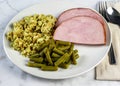 sliced ham, with green beans and stuffing