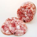 Sliced head cheese on white table Royalty Free Stock Photo