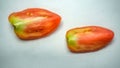 Sliced healthy tomato on white. Healthy food for human body.