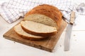 Sliced home baked bread on a cutting board