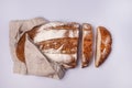 Sliced Homemade Wheat Bread are Lying on Linen Napkin Blue Background Minimalism Top View Tasty Homemade Bread Horizontal