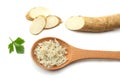 sliced horseradish root with parsley isolated on white background Royalty Free Stock Photo