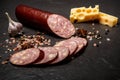 Sliced jalapeno cheddar summer sausage with cheese and garlic Royalty Free Stock Photo