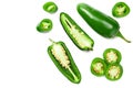 sliced jalapeno peppers isolated on white background. Green chili pepper. Capsicum annuum. top view Royalty Free Stock Photo