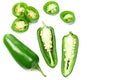 sliced jalapeno peppers isolated on white background. Green chili pepper. Capsicum annuum. top view Royalty Free Stock Photo