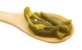 Sliced jalapeno peppers on a wood spoon Royalty Free Stock Photo