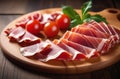 Sliced jamon on a wooden dish