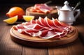 Sliced jamon on a wooden dish Royalty Free Stock Photo
