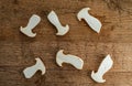 Sliced king trumpet mushrooms on a background of wood Royalty Free Stock Photo