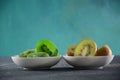 Sliced kiwi fruit in pieces fresh and dried