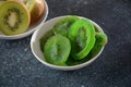 Sliced kiwi fruit in pieces fresh and dried