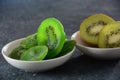 Sliced kiwi fruit in pieces fresh and dried