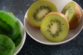 Sliced kiwi fruit in pieces fresh and dried