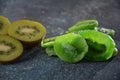 Sliced kiwi fruit in pieces fresh and dried