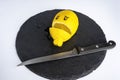 sliced lemon and fruit knife cutting board, drama, joke, tragedy, crime