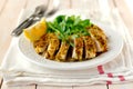 Sliced lemon herb crusted chicken breast Royalty Free Stock Photo