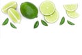 Sliced lime vith leaves isolated on white background with copy space for your text. Top view. Flat lay pattern Royalty Free Stock Photo