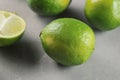 sliced limes on a gray