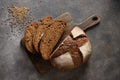 Loaf of freshly baked Hemp bread on brown background. Royalty Free Stock Photo