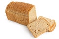 Sliced loaf of whole wheat toast bread isolated on white. Three slices lying